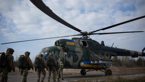 krainian paratroopers head to the Mil Mi-8 helicopter to practice parachute jumps at a training ground on March 27, 2026 in Unspecified, Ukraine. The development of drones and robotic systems on the battlefield is increasingly affecting the conduct of modern warfare. Parachuting in open terrain has become ineffective and too dangerous both due to the large number of reconnaissance drones and the latest air defense systems. The advance is now happening differently: strike drones are the first to go. And the 