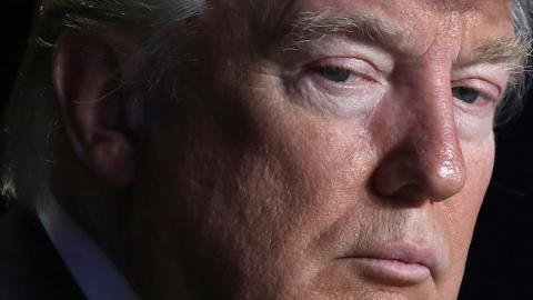 U.S. President Donald Trump listens to remarks at the National Prayer Breakfast February 2, 2017 in Washington, DC. (Win McNamee/Getty Images)