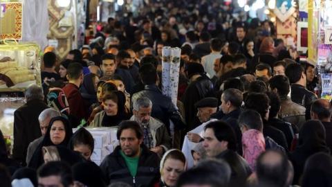 Iranians shop in Tehran's ancient Grand Bazaar on January 16, 2016. (ATTA KENARE/AFP/Getty Images)