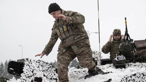 British soldiers take part in a major drill as part of NATO's "enhanced forward presence" (EFP) deployment in Poland and the Baltic nations of Estonia, Latvia, and Lithuania, at the Tapa Estonian army camp near Rakvere on February 5, 2022. (Getty Images)