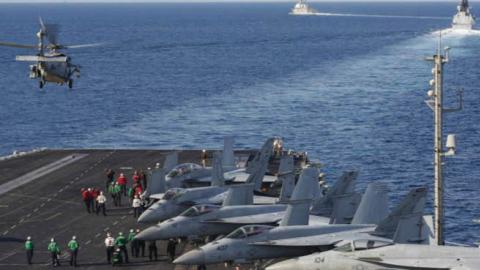 USS Abraham Lincoln (CVN 72)  as an MH-60S Sea Hawk helicopter lifts off from the flight deck on November 19, 2019. (Getty Images)