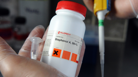 A scientist holds a flask containing the chemical Bisphenol-A, on October 9, 2012 at the French national institute for Agronomical research in Toulouse.(REMY GABALDA/AFP/GettyImages)