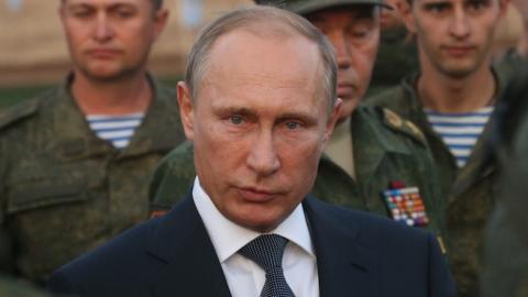 Russian President Vladimir Putin visits the Center-2015 Military Drills at Donguzsky Range in Orenburg, Russia, September 19, 2015. (Sasha Mordovets/Getty Images)