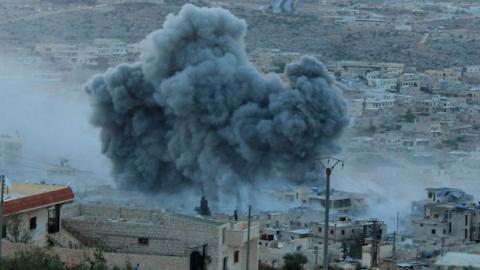 Russian warcrafts hit the Syrian opposition controlled town Daret Ezza in Aleppo, Syria on October 13, 2015. (Mamun Abu Omer/Anadolu Agency/Getty Images)