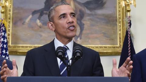 US President Barack Obama speaks on the Keystone XL pipeline, flanked by Secretary of State John Kerry (R), and Vice President Joe Biden, on November 6, 2015 in the Roosevelt Room of the White House in Washington, DC. (MANDEL NGAN/AFP/Getty Images)