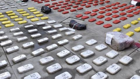 Bolivia's Interior Minister Carlos Romero (R) presents drug seized in La Paz, on September 4, 2015. (Aizar Raldes Nunez/AFP/Getty Images)