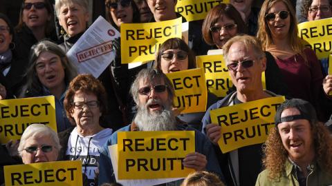 Activists gather outside Sen. Michael Bennet's office in Denver to oppose President Trump's nominee for EPA Administrator, Oklahoma Attorney General Scott Pruitt, January 23, 2017. (RJ Sangosti/The Denver Post via Getty Images)