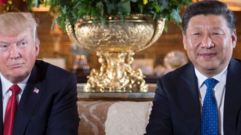 US President Donald Trump sits with Chinese President Xi Jinping during a bilateral meeting, April 6, 2017 (JIM WATSON/AFP/Getty Images)