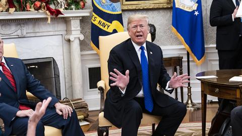 President Donald Trump debates with then House Minority Leader Nancy Pelosi Senate Minority Leader Chuck Schumer as Vice President Mike Pence listens during a meeting on Tuesday, Dec. 11, 2018 in Washington, DC. (Jabin Botsford/Getty Images)