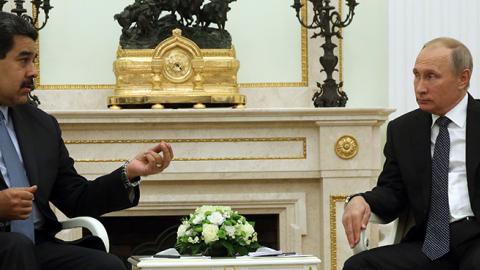 Russian President Vladimir Putin talks Venezuela's President Nicolas Maduro during their meeting at the Kremlin on October 4, 2017 in Moscow, Russia. (Photo by Mikhail Svetlov/Getty Images)