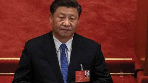 Chinese president Xi Jinping listens during the closing session of the National People's Congress, which included a vote on a new draft security bill for Hong Kong, at the Great Hall of the People on May 28, 2020 in Beijing, China. 