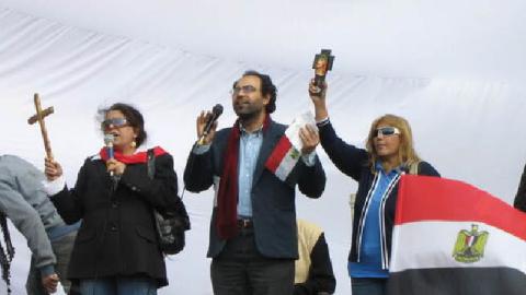 Coptic Christians pray during a protest in Tahrir Square during the 2011 Egyptian protests.