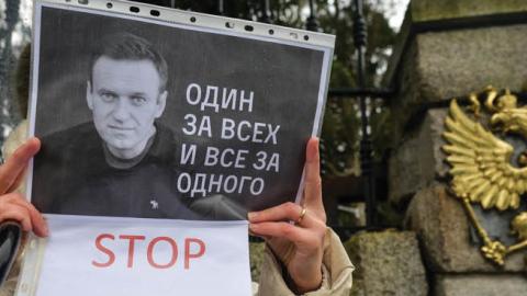 A protester in front of the Russian embassy in Dublin, Jan. 31.