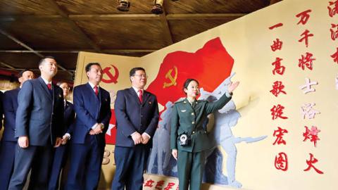 Judges from the Qilian Mountains ecological court visit the Liyuankou Battle Memorial Hall to mark the 100th anniversary of the founding of the Communist Party of China (CPC) (Photo by Wang Jiang/VCG via Getty Images)