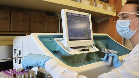 Medical laboratory scientist, Aniela Sobel, tests serology samples from the Novavax phase 3 Covid-19 clinical vaccine trial at the UW Medicine Retrovirology Research Lab at Harborview Medical Center on February 12 (Photo by Karen Ducey/Getty Images)