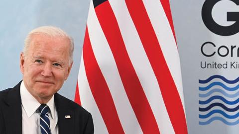 U.S. President Joe Biden poses for a picture during a meeting with Britain's Prime Minister Boris Johnson (not pictured) ahead of the G7 summit, at Carbis Bay Hotel, on June 10, 2021 near St Ives, England (Photo by Toby Melville - WPA Pool/Getty Images)