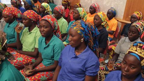 Relatives of abducted girls after the releasing 82 of school girls, kidnapped by Boko Haram in Chibok back in 2014, at Aso Rock Presidential Villa in Abuja, Nigeria on May 7, 2017. (Photo by Sodiq Adelakun/Anadolu Agency/Getty Images)