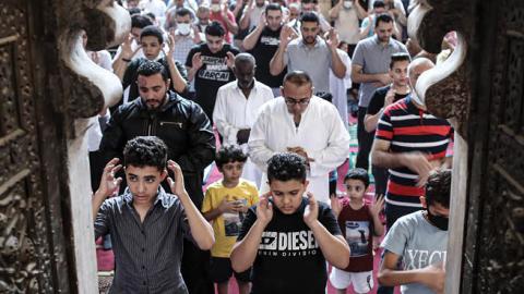 Muslims perform Eid al-Adha morning prayers at Sultan Hassan Mosque (Photo by Omar Zoheiry/picture alliance via Getty Images)