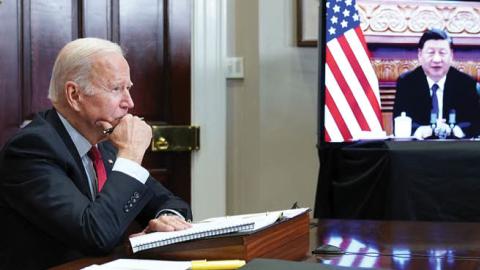 U.S. President Joe Biden meets with China's President Xi Jinping during a virtual summit from the Roosevelt Room of the White House in Washington, DC, November 15, 2021. (Photo by MANDEL NGAN/AFP via Getty Images)