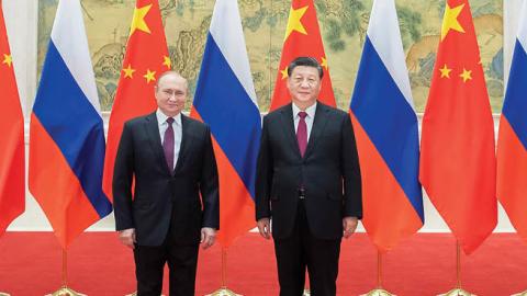 Chinese Leader Xi Jinping holds talks with Russian President Vladimir Putin at the Diaoyutai State Guesthouse in Beijing, capital of China, Feb. 4, 2022. (Photo by Li Tao/Xinhua via Getty Images)