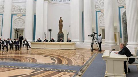 Russian President Vladimir Putin chairs a meeting of big businesses at the Kremlin in Moscow on February 24, 2022. (Photo by Alexey Nikolsky/SPUTNIK/AFP via Getty Images)