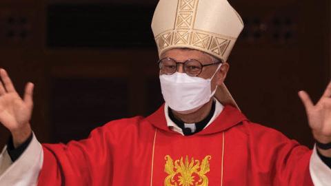 Bishop Stephen Chow waves to church members at the Episcopal Ordination of the Most Reverend Stephen Chow in Hong Kongs Cathedral of the Immaculate Conception on December 4, 2021. (Photo by Bertha Wang/AFP via Getty Images)