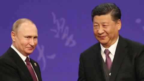 Russian President Vladimir Putin with Chinese Leader Xi Jinping at Friendship Palace on April 26, 2019 in Beijing, China. (Photo by Kenzaburo Fukuhara - Pool/Getty Images)