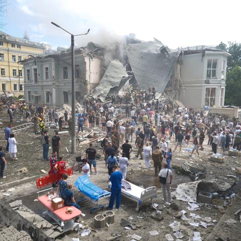 People clear rubble at a Ukrainian children's hospital which was partially destroyed by a Russian missile strike on July 8, 2024, in Kyiv, Ukraine. (Vitalii Nosach/Global Images Ukraine via Getty Images)