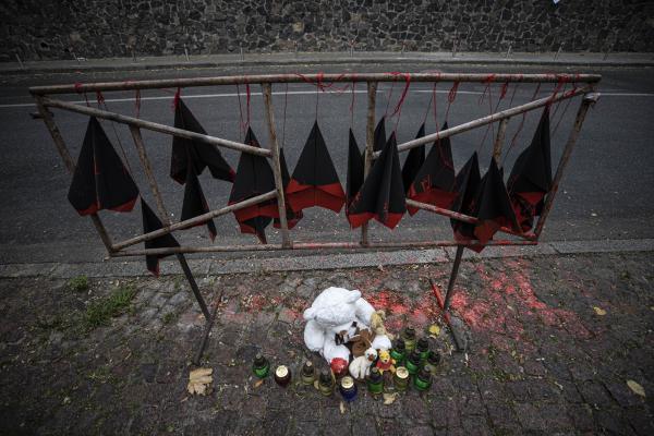 Paper planes hang in front of the Iranian Embassy during a protest against Iran's supply of drones to Russia in Kyiv, Ukraine, on October 18, 2022. (Metin Aktas/Anadolu Agency via Getty Images)