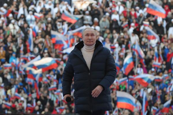 Russian President Vladimir Putin attends a concert marking the eighth anniversary of Russia's annexation of Crimea at the Luzhniki stadium in Moscow on March 18, 2022. (Getty Images)