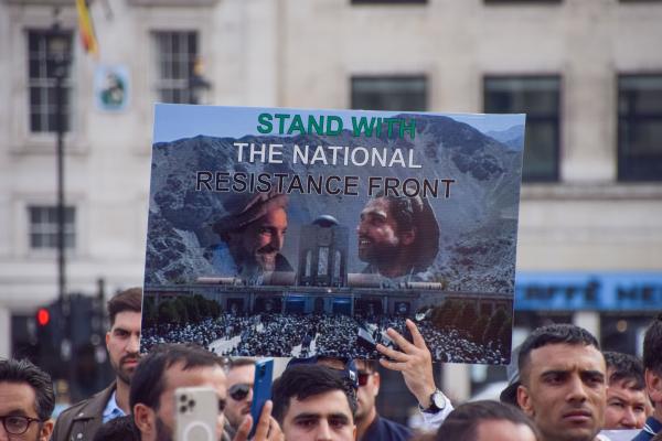 A demonstrator holds a pro–National Resistance Front placard during a protest in Trafalgar Square on September 12, 2021. (Vuk Valcic/SOPA Images/LightRocket via Getty Images)