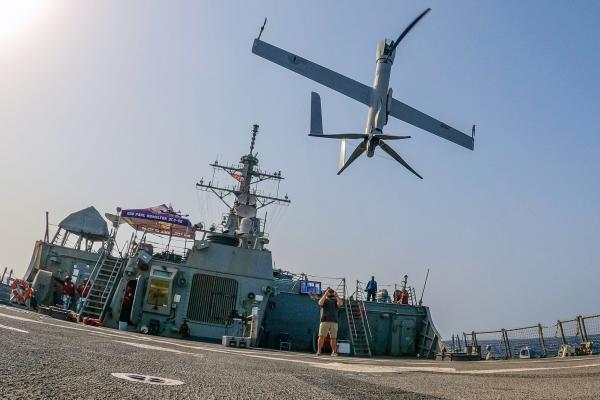 An Aerovel Flexrotor unmanned aerial vehicle lands on the flight deck of guided-missile destroyer USS Paul Hamilton in the Gulf of Oman on June 26, 2023. (Elliot Schaudt via DVIDS)