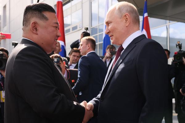 Russia's President Vladimir Putin shakes hands with North Korea's leader Kim Jong Un during their meeting at the Vostochny Cosmodrome in Amur Oblast, Russia, on September 13, 2023. (Mikhail Metzel via Getty Images)