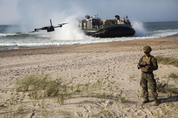 A U.S. Marine assigned to the Battalion Landing Team 1/6, 26th Marine Expeditionary Unit (Special Operations Capable) (26MEU(SOC)), pilots a Skydio Unmanned Aerial System during an amphibious landing for Northern Coast 2023 (NOCO 23) in Ventspils, Latvia, Sept. 12, 2023. NOCO 23 is a German-led multinational exercise that strengthens military and maritime combat readiness through realistic training in order to sharpen interoperability with our Allies and partners. The San Antonio-class amphibious ship USS M