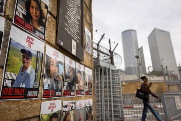 The image of rescued Israeli-Argentinian hostage Louis Har with the word "rescued" written on it outside the Ministry of Defence in Tel Aviv on February 12, 2024 (Oren Ziv/AFP via Getty Images)