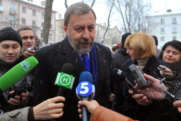 Belarusian presidential candidates Andrei Sannikov speaks to journalists after voting in Minsk, Belarus, on December 19, 2010. (Photo by Maksim Malinouski/AFP via Getty Images)