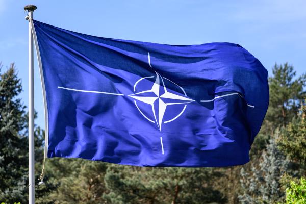 A NATO flag flies on April 30, 2024. (Photo by Robert Michael/picture alliance via Getty Images)