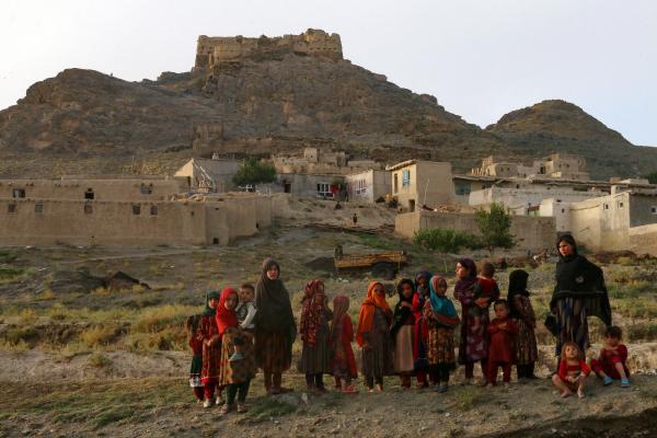 Afghan girls gather near their house in Ghazni, Afghanistan, on August 19, 2024. (Photo by Mohammad Faisal Naweed/AFP via Getty Images)