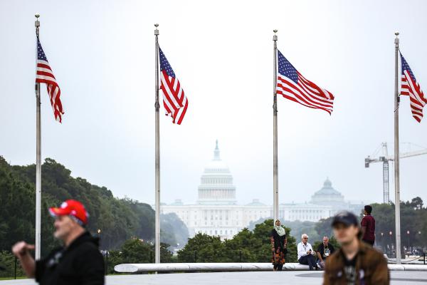 US flags fly in front of the White House on October 3, 2024. (Valerie Plesch/picture alliance via Getty Images)