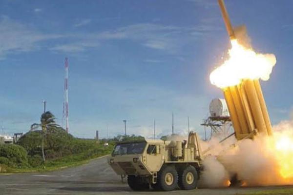 The first of two Terminal High Altitude Area Defense (THAAD) interceptors is launched during a successful intercept test. (U.S. Army)