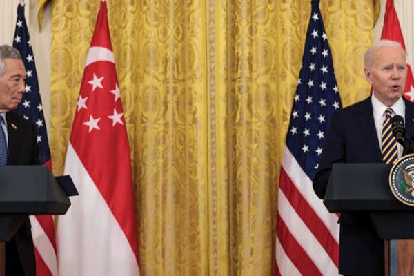 U.S. President Joe Biden delivers remarks alongside Prime Minister Lee Hsien Loong of Singapore in the East Room of the White House on March 29, 2022, in Washington, DC. (Getty Images)