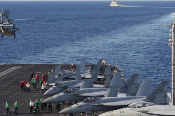 USS Abraham Lincoln (CVN 72)  as an MH-60S Sea Hawk helicopter lifts off from the flight deck on November 19, 2019. (Getty Images)