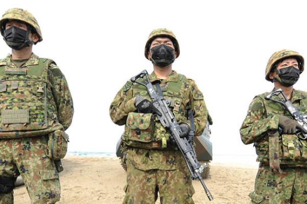 Japan's Self-Defense Forces conduct landing training on November 25, 2021, at Tanegashima, an island of Kagoshima Prefecture. (Getty Images)