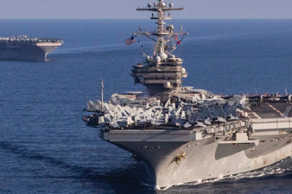 The Nimitz-class aircraft carrier USS  <i>George H.W. Bush </i> operates with the Nimitz-class aircraft carrier USS  <i>Harry S. Truman </i> in the Ionian Sea on August 27, 2022. (US Navy photo/Seaman Samuel Wagner)