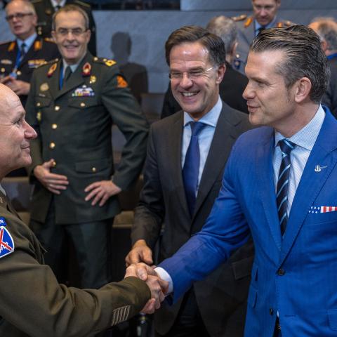 Defense Secretary Pete Hegseth greets Supreme Allied Commander Europe General Christopher Cavoli before the North Atlantic Council meeting of defense ministers on February 13, 2025, in Brussels, Belgium. (Omar Havana via Getty Images)