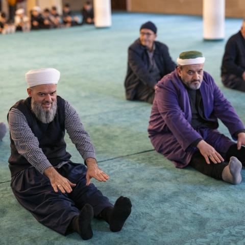 Worshippers take part in a fitness session after prayer in a mosque of the Bagcilar district in Istanbul on February 8, 2024. (Yasin Akgul via Getty Images)