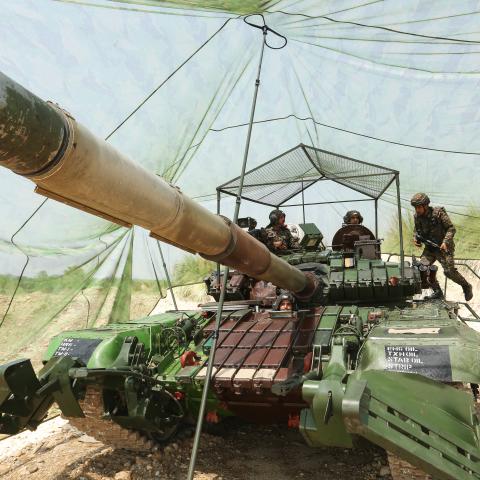 Indian army soldiers are seen atop a tank near the Line of Control near Akhnoor, India, on May 19, 2025. (Mukesh Gupta via Getty Images)