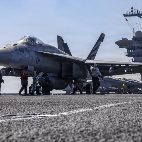 An F/A-18E Super Hornet prepares to launch from the flight deck of the USS Abraham Lincoln in the Arabian Sea on February 15, 2026. (US Navy)