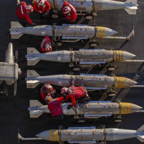U.S. Sailors prepare to stage ordnance on the flight deck of Nimitz-class aircraft carrier USS Abraham Lincoln (CVN 72) in support of Operation Epic Fury, Feb. 28, 2026. (U.S. Navy photo)