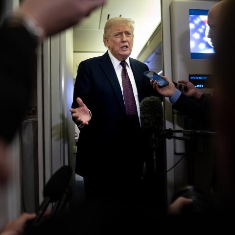 President Donald Trump speaks to members of the media on board Air Force One on March 15, 2026. (Getty Images)